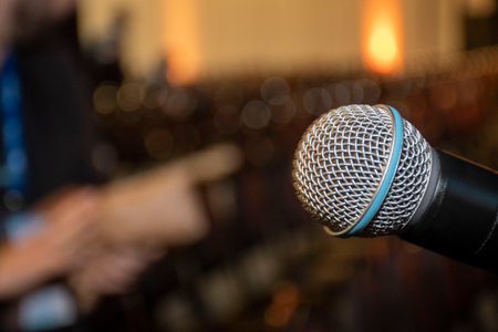 Microphone in conference room closeup with copy spaceの写真素材