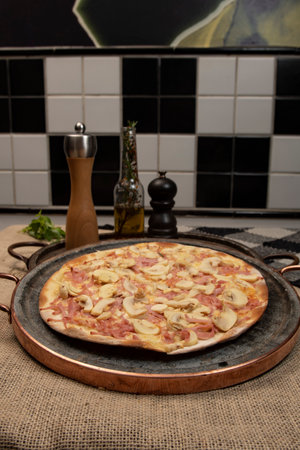 Brazilian mushroom, cheese and ham pizza, top viewの写真素材