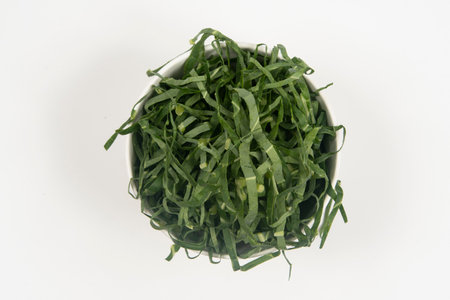 Cabbage chopped into strips in pot isolated.の写真素材