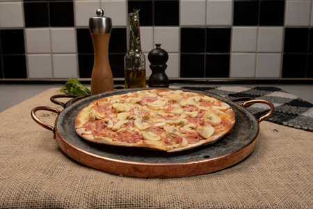 Brazilian mushroom, cheese and ham pizza, top viewの写真素材