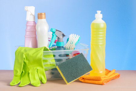 basket with cleaning products for home hygiene use with plastic packagingの写真素材