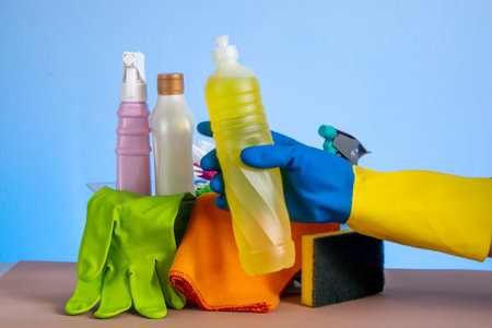 basket with cleaning products for home hygiene use with plastic packagingの写真素材
