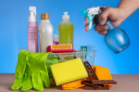 basket with cleaning products for home hygiene use with plastic packagingの写真素材