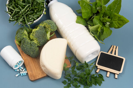 main sources of calcium for the body to help fight osteoporosis with a boardの写真素材