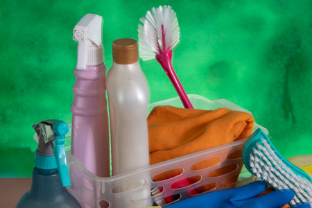 basket with cleaning products for home hygiene use with plastic packagingの写真素材