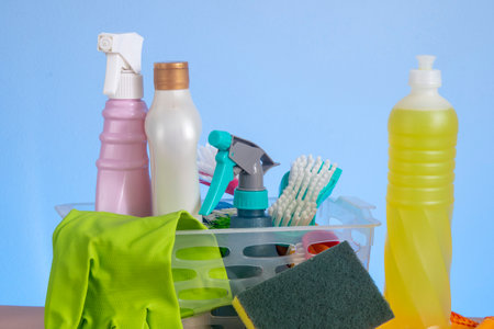 basket with cleaning products for home hygiene use with plastic packagingの写真素材