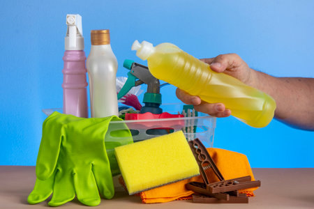 basket with cleaning products for home hygiene use with plastic packagingの写真素材