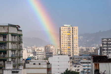 Rio, Brazil - January 03, 2023: rainbow scene in urban area with buildingのeditorial素材
