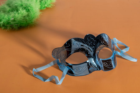 carnival mask forming frame in one of the lower corners with space for textの写真素材