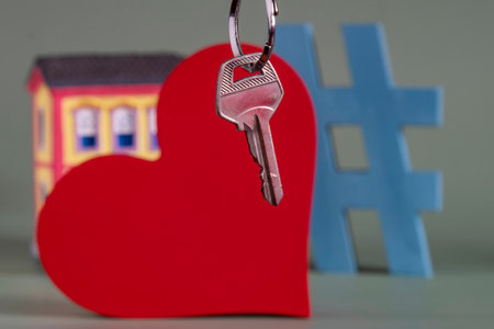 House symbol with metal key and Real estate, concept of insurance, mortgage, home buying and selling, realtor conceptの写真素材