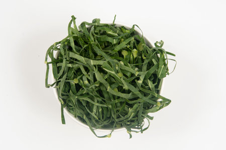 Cabbage chopped into strips in pot isolated.の写真素材