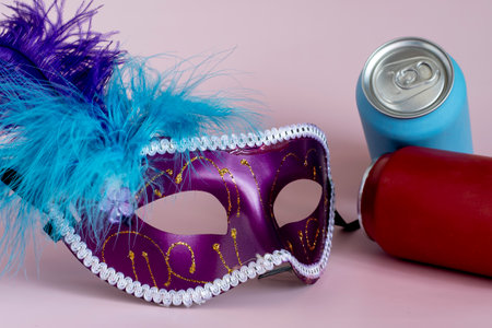 Hydration concept, drinking a lot of water during carnival holiday, bottle with venetian mascaraの写真素材