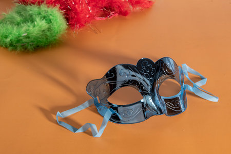 carnival mask forming frame in one of the lower corners with space for textの写真素材