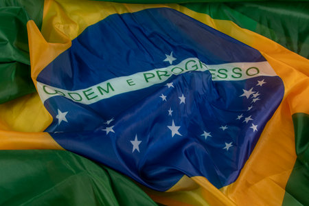 flag of Brazil in wave filling the frameの写真素材
