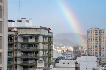 Rio, Brazil - January 03, 2023: rainbow scene in urban area with buildingのeditorial素材