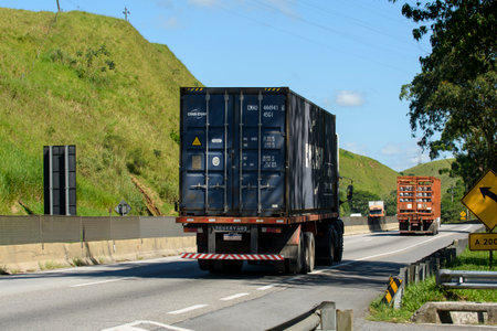 Rio, Brazil - october 17, 2023 - cargo truck with container used on a ship on a road in Brazil - Presidente Dutraのeditorial素材