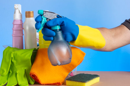 basket with cleaning products for home hygiene use with plastic packagingの写真素材