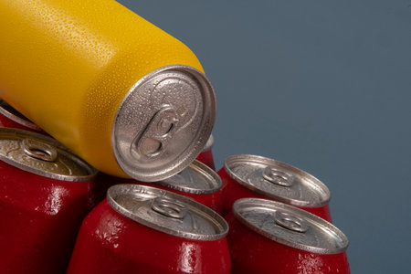 Group of aluminum soda cans, chilled, frozen and with water dropsの写真素材
