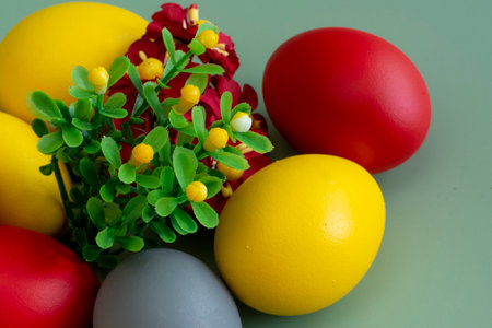 Colorful easter eggs on green background, closeup. happy easterの写真素材