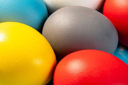 eggs painted in different colors to symbolize the passage of Christian Easterの写真素材