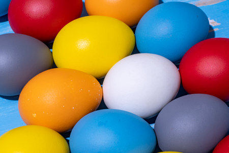 eggs painted in different colors to symbolize the passage of Christian Easterの写真素材