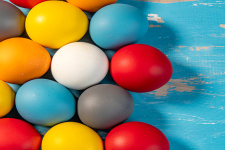 eggs painted in different colors to symbolize the passage of Christian Easterの写真素材