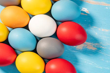 eggs painted in different colors to symbolize the passage of Christian Easterの写真素材