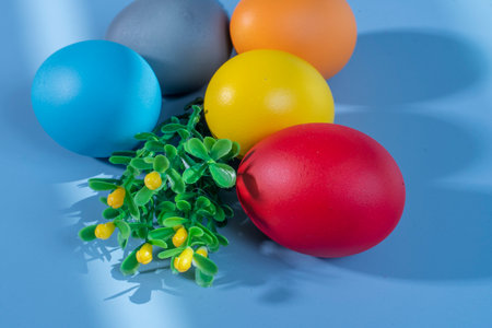 Colorful easter eggs on a blue background. Happy Easter.の写真素材
