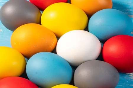 eggs painted in different colors to symbolize the passage of Christian Easterの写真素材