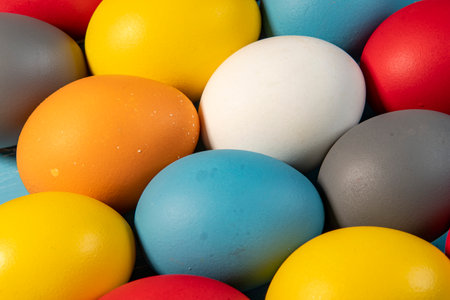 eggs painted in different colors to symbolize the passage of Christian Easterの写真素材