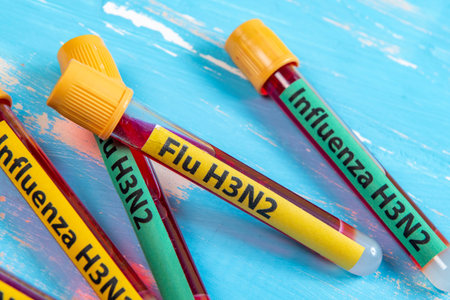 vacuum vials for blood collection written FLU H3N2 in reference to the flu type