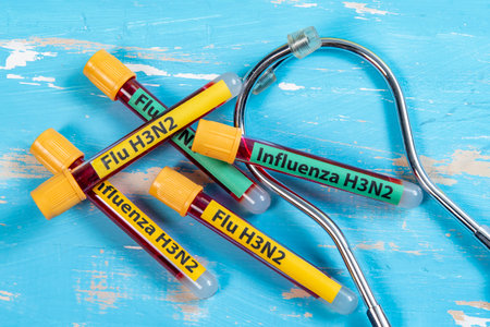 vacuum vials for blood collection written FLU H3N2 in reference to the flu typeの写真素材