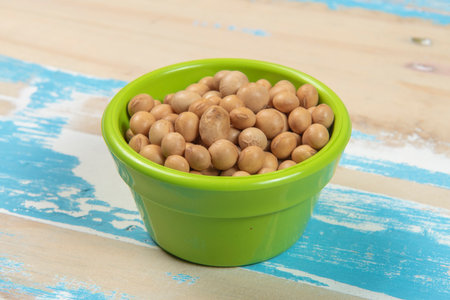 bowl with soy beans on blue rustic wooden table, Up viewの写真素材
