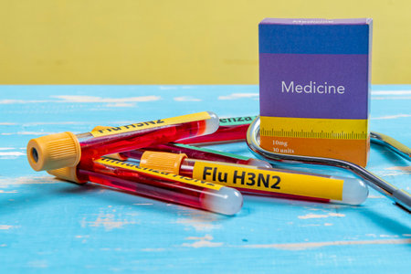 vacuum vials for blood collection written FLU H3N2 in reference to the flu typeの写真素材