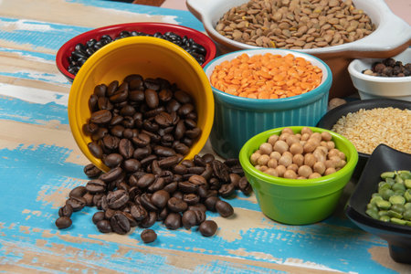 assorted bowls with raw grain and seeds viewed from aboveの写真素材