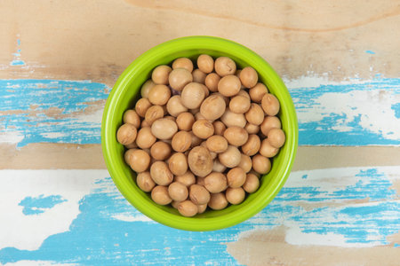 bowl with soy beans on blue rustic wooden table, Top viewの写真素材