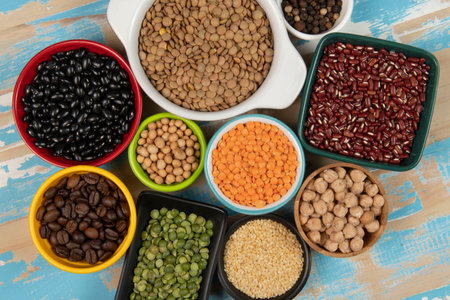 assorted bowls with raw grain and seeds viewed from aboveの写真素材