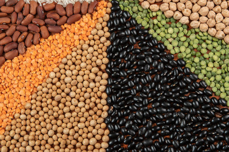 Different types of beans and lentils as background, closeup viewの写真素材