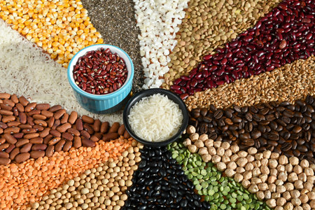 Different types of vegetables and grains on color background, top viewの写真素材