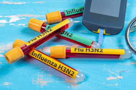 vacuum vials for blood collection written FLU H3N2 in reference to the flu typeの写真素材