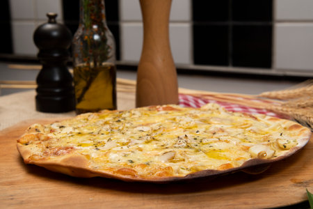 Brazilian mushroom, cheese and oregano pizza, top viewの写真素材