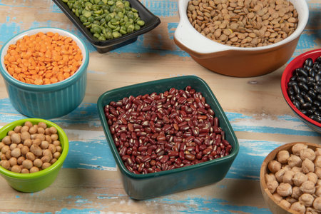assorted bowls with raw grain and seeds viewed from aboveの写真素材