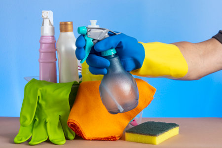basket with cleaning products for home hygiene use with plastic packagingの写真素材