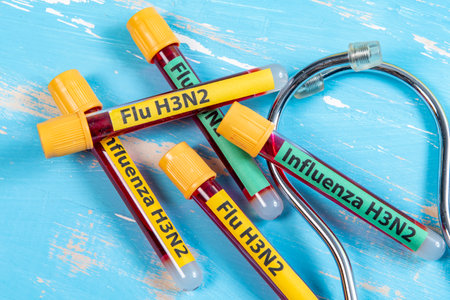 vacuum vials for blood collection written FLU H3N2 in reference to the flu typeの写真素材