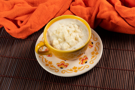 cup of canjica, typical food consumed in the Brazilian Festa Juninas (June Party)の写真素材