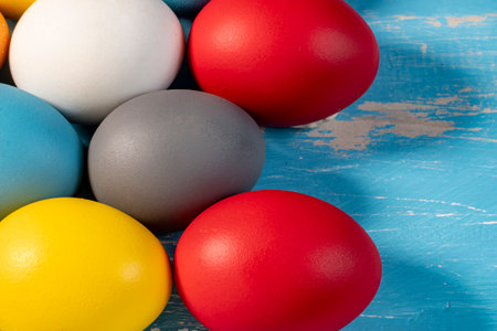 eggs painted in different colors to symbolize the passage of Christian Easterの写真素材