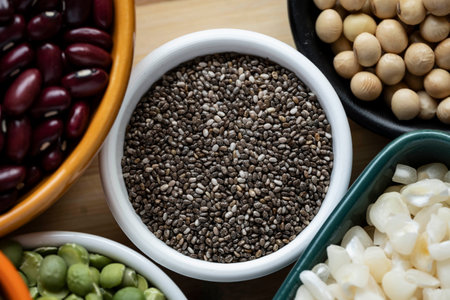 several bowls with raw grains for preparing culinary dishes, top viewの写真素材