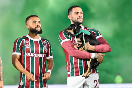 Rio, Brazil - November 27, 2025: Action involving players with dogs for animal adoption during the game between Fluminense 6 x 0 Sao Paulo by 36th round of Brazilian Championship at the Maracana stadiumのeditorial素材