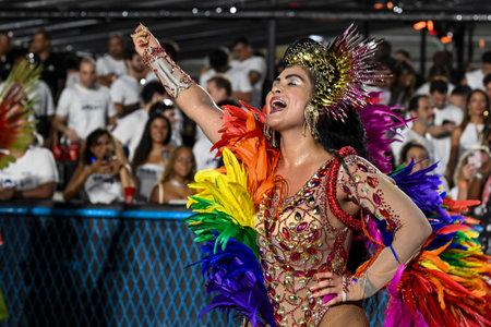 Rio de Janeiro, Brazil - February 13, 2026: A performer from Unidos de Bangu samba school parades at...