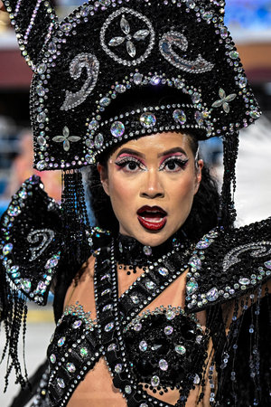 Rio de Janeiro, Brazil - February 13, 2026: A performer from Academicos de Vigario Geral samba...